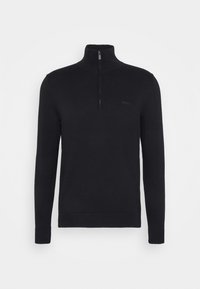 Suéter de punto negro con un alto cuello y una cremallera corta. Presenta mangas largas y un sutil detalle de logo en el pecho.