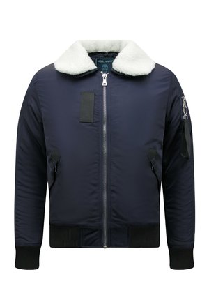 Marineblauw bomberjack met witte nepbontkraag, ritssluiting aan de voorkant, een zijzak met rits op de mouw en geribde boorden en zoom.