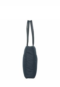Sac fourre-tout matelassé bleu marine avec des poignées en cuir lisse, de forme arrondie, poche latérale zippée et texture douce.
