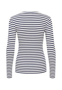 Chemise ajustée à manches longues avec des rayures horizontales bleu marine et blanches, vue de dos sur un fond blanc.