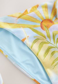 Never Fully Dressed Spodnji deli kopalk - blue sun