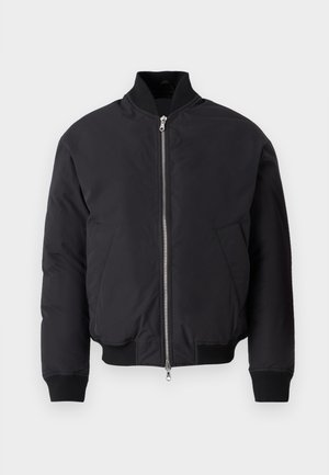 Black bomber jacket with a high collar, zip front, two side pockets, ribbed cuffs, and hem. Smooth, matte finish fabric.