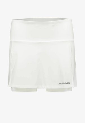 Jupe de tennis blanche avec shorts intégrés, fabriquée en tissu léger. Présente une texture lisse et un détail de logo gris sur l'ourlet gauche.