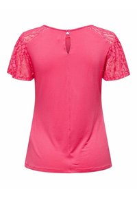 Blusa rosa a maniche corte con maniche in pizzo floreale trasparente e una piccola apertura a forma di chiave nella parte superiore della schiena.
