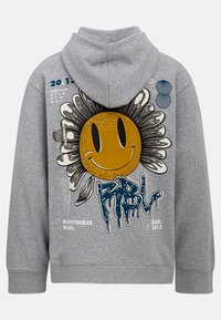 Felpa grigia con cappuccio regolabile. Presenta una grande grafica di un sole sorridente circondato da petali e vari elementi di testo stampati.