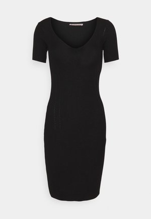 Černé pletené bodycon šaty s hlubokým véčkovým výstřihem a krátkými rukávy. Obsahují jemné boční detaily a přiléhavý střih.