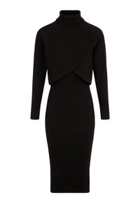 Abito a coste nere con collo alto, maniche lunghe e un design asimmetrico con top corto. Silhouette aderente.