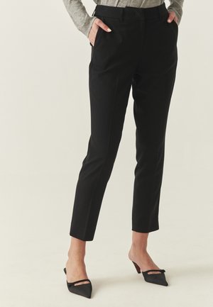 KOLIA - Stoffhose - black