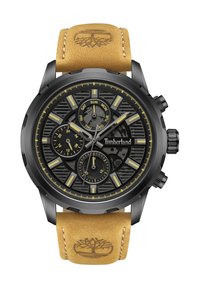 Montre chronographe noire avec un cadran noir texturé, des accents jaunes et un bracelet en cuir brun avec un logo en relief.