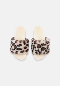 Leopard print fur slide sandals with a plush strap, beige footbed, and exposed sole. Soft texture and open-toe design for easy wear.