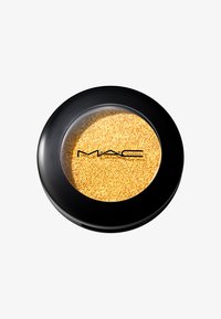 Goldene Glitzerpulver in einem schwarzen runden Behälter mit einem transparenten Deckel, der auf der Vorderseite den Markennamen "MAC" in schwarzen Buchstaben zeigt.