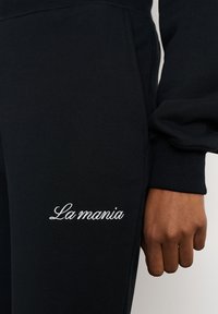 LA MANIA Treningo apatinė dalis - black