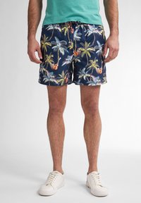 Námořnické plavky s barevným vzorem palem a kytar. Mají elastický pas se stahovací šňůrkou a boční kapsy. Texturovaná tkanina.