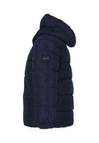 Giacca puffer navy con cappuccio, caratterizzata da un design trapuntato, polsini elasticizzati e un'etichetta quadrata con logo sulla manica sinistra. Texture liscia.