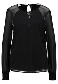 Blusa nera a maniche lunghe con maniche trasparenti e inserti in pizzo sul collo, caratterizzata da un polsino arriccicato e chiusura con bottone a chiave sul retro.