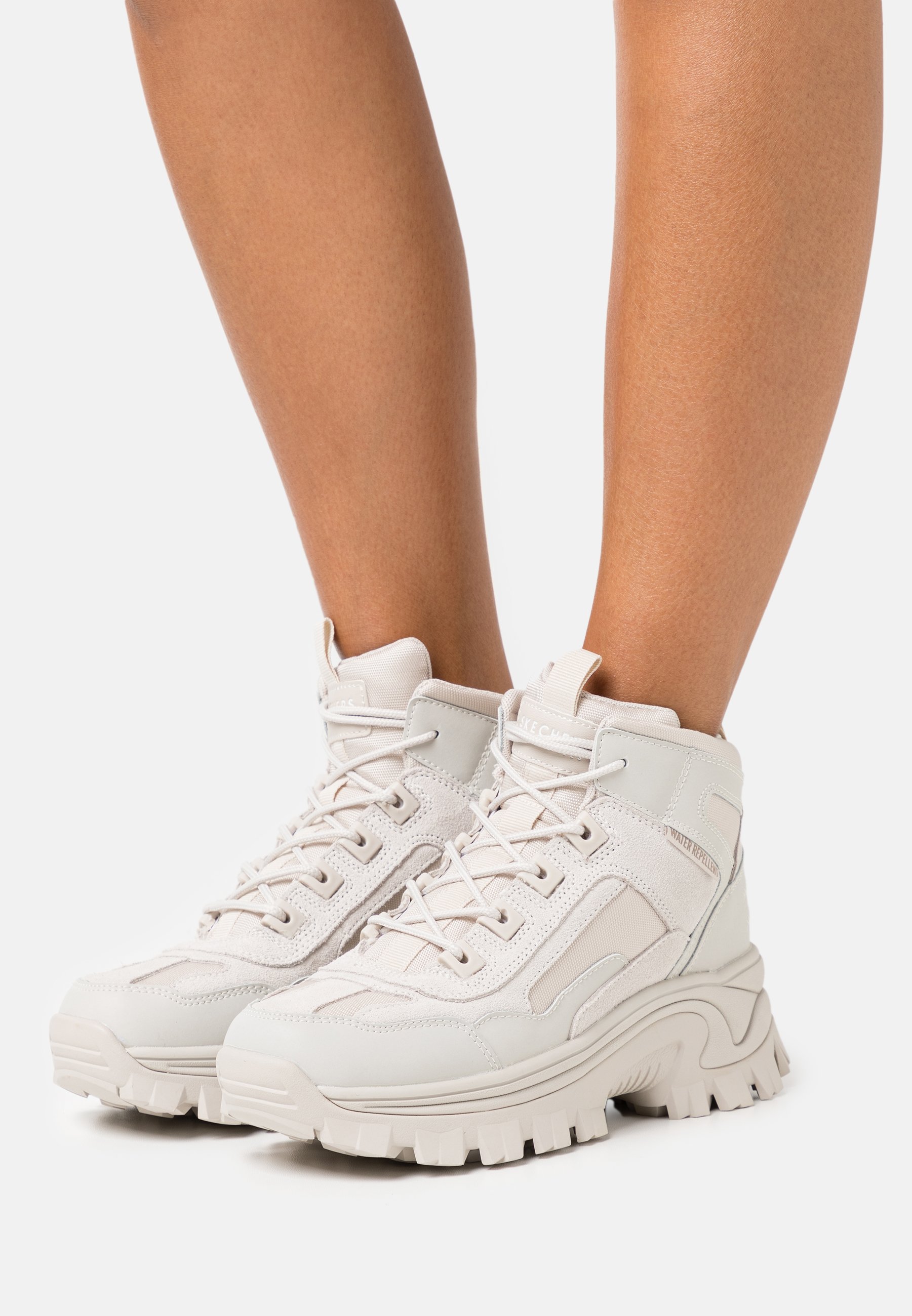 skechers boots white