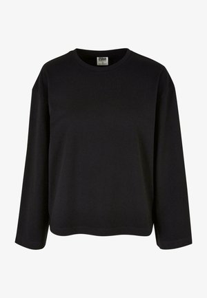 Čierne tričko s dlhým rukávom vyrobené z mäkkej látky, s okrúhlym výstrihom, voľným strihom a mierne zakriveným lemom pre pohodlie a ľahký pohyb.