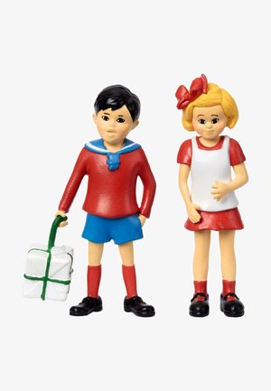 Two plastic figurines: a boy in a red shirt and blue shorts holding a white gift with a green handle, and a girl in a red dress with a white apron.