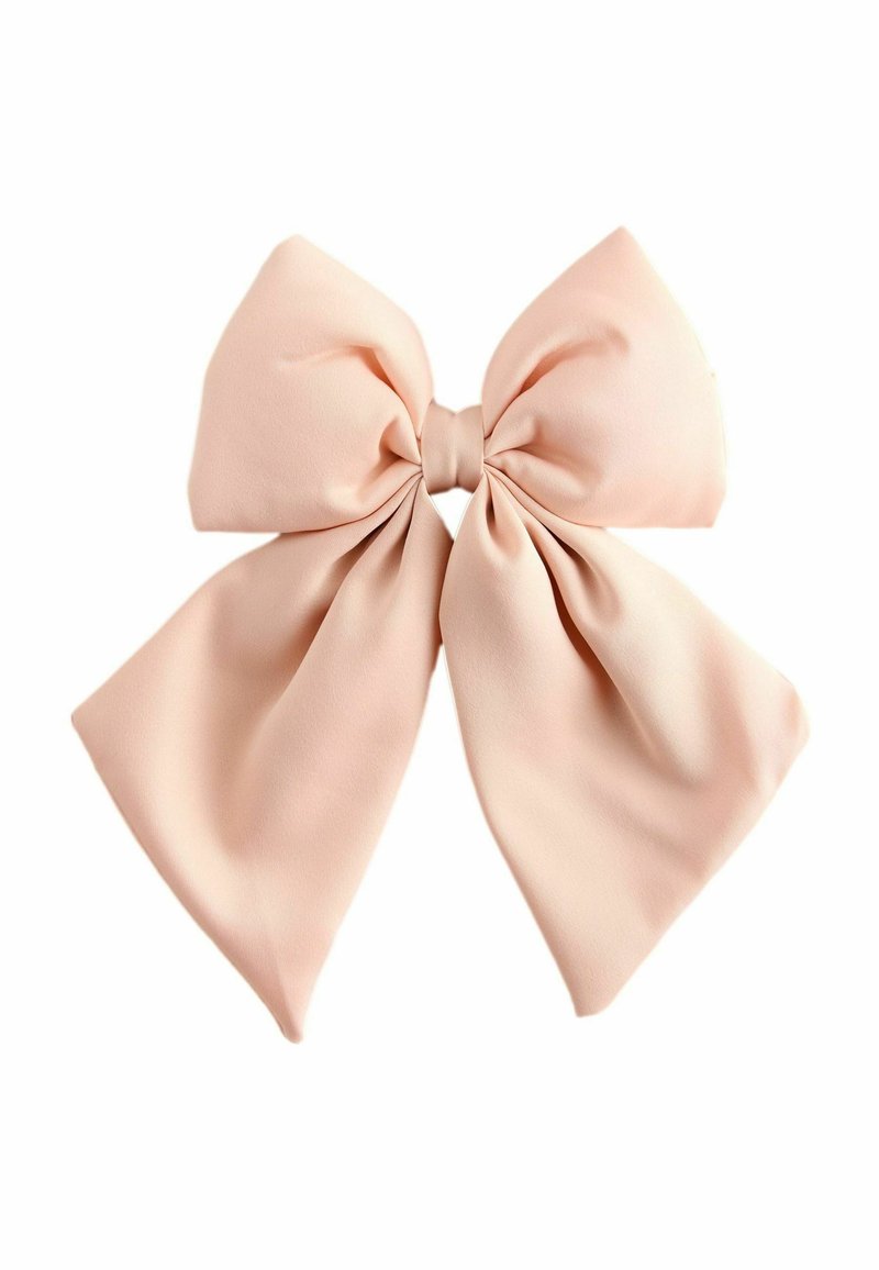 Un nœud en tissu rose clair avec un nœud central, comportant de larges boucles fluides et une texture lisse. Convient pour les accessoires capillaires.