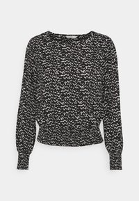 Schwarze Bluse mit weißem abstraktem Muster, runder Halsauschnitt, lange elastische Ärmel und gerafftem Saum für eine figurbetonte Silhouette. Leichter Stoff.