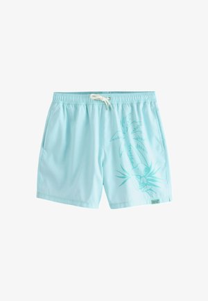 Svjetloplave kupaće kratke hlače s elastičnim pojasom i vezicom. Na lijevoj nogavici nalazi se grafika lika pored palmi.