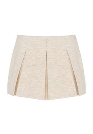 Mini-jupe plissée beige avec une coupe structurée, ajustée et une texture subtile, présentée sur fond blanc.