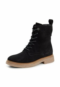 Sort ruskind ankelstøvle med afrundet tå, snørelukning foran og en robust brun gummisål med tekstureret finish.