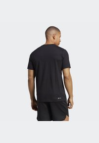 adidas Performance ESSENTIALS FEELREADY - Sports T-shirts - black/white
