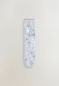 Gray sock with white and metallic polka dots, featuring a snowman and dog graphic. Made of soft fabric with a smooth texture.
