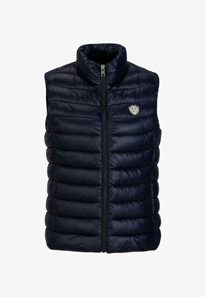 Marine blauwe puffer vest met hoge kraag, ritssluiting aan de voorkant, en een doorgestikt ontwerp. Bevat een klein logo-opdruk aan de linkerkant. Soepel, lichtgewicht materiaal.