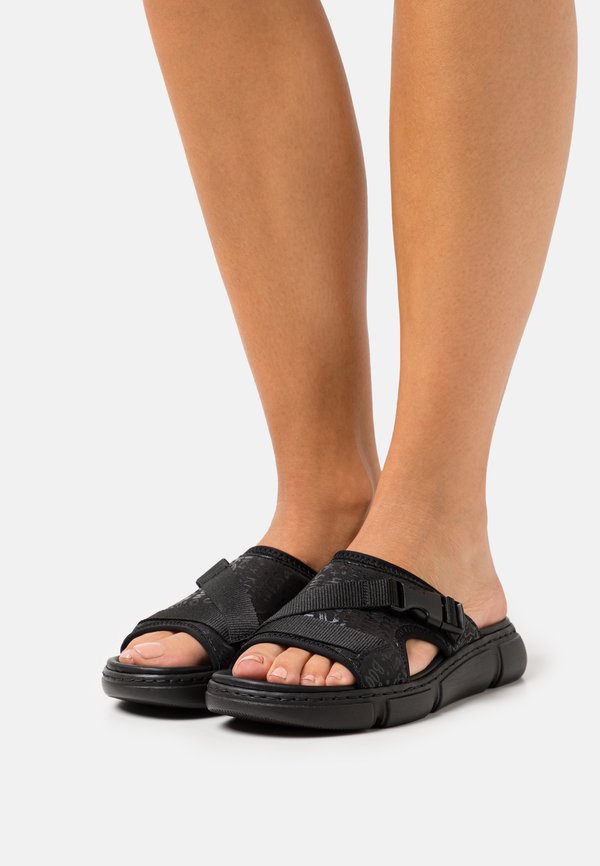 Pantolette flach - schwarz