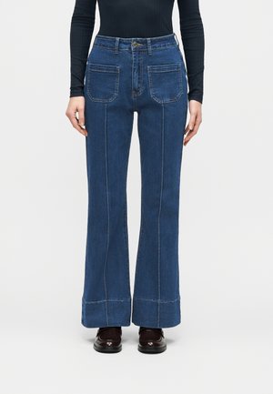 Džinsi ar paplatinātiem galiem - dark blue denim