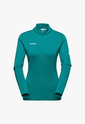 Teal tröja med halv dragkedja i kragen. Tillverkad av mjukt material, den har långa ärmar och "Mammut"-logotypen i vitt på framsidan.