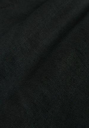 Black fabric with a slightly textured surface, featuring a consistent weave pattern and soft drape, suitable for various applications.