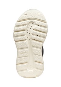 Semelle de chaussure en caoutchouc blanc avec des motifs texturés, comportant des trous de ventilation et une marque en relief. Offre adhérence et confort pour une utilisation quotidienne.