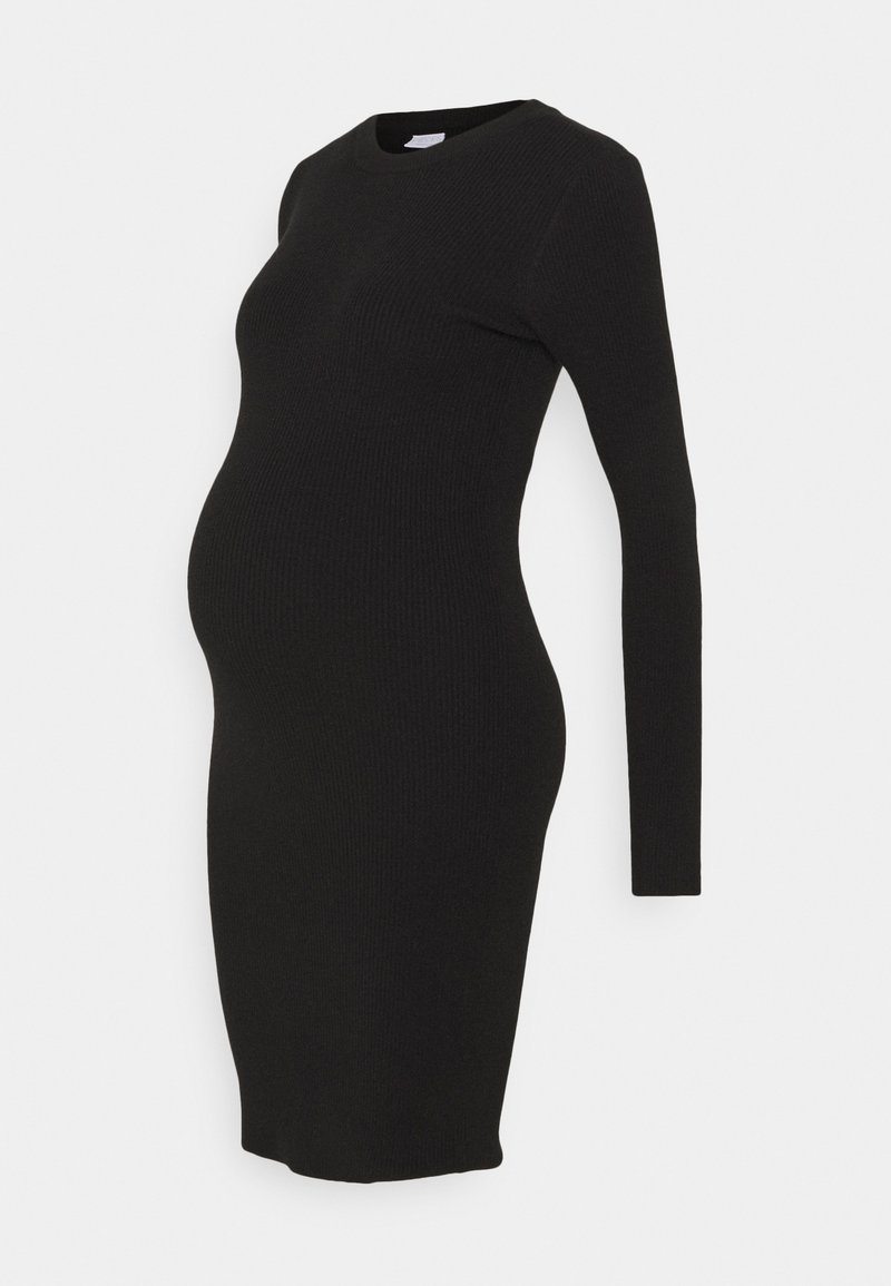 Robe de maternité noire côtelée à manches longues et à encolure ronde, conçue pour s'adapter à un ventre qui s'arrondit.