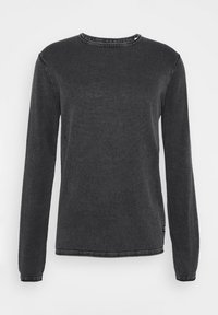 Grå langermet sweatshirt med rund hals. Myk tekstur, subtile sømdetaljer langs sømmene. Enkle, avslappede linjer.