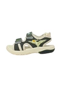 Sandali da esterno con tomaia in rete nera, suola in gomma beige, cinghie regolabili e logo di un uccello verde sul lato.