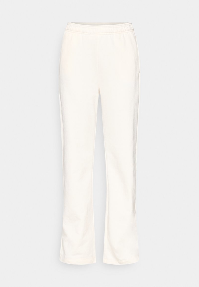 Champion ICONS FLARE PANTS - Tracksuit bottoms - off-white - Zalando.co.uk
