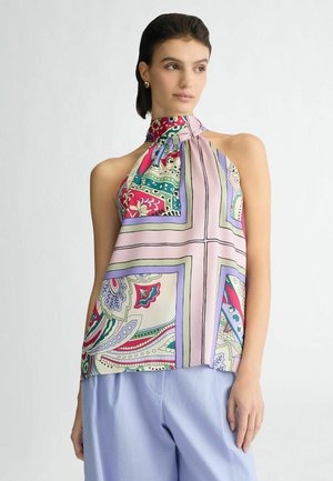 Silk halter top in pastel colors with intricate paisley and floral patterns, featuring a tied neck and flowing silhouette.