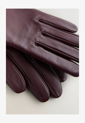 Mănuși din piele de culoarea burgundului cu textură netedă, având un design drept al degetelor și accente subtile de cusături, aranjate ordonat pe un fundal deschis.