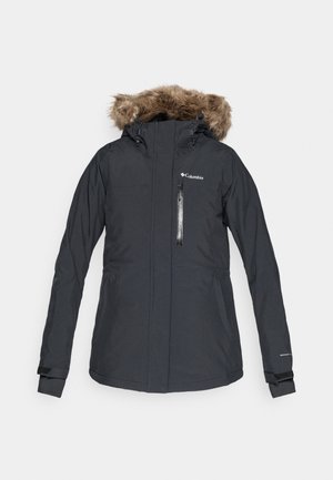 Chaqueta negra a prueba de agua con capucha forrada de pelo, bolsillo frontal con cremallera, puños ajustables y logo de Columbia en la parte superior izquierda del pecho.