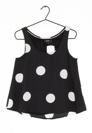 Black sleeveless top with large white polka dots, scoop neckline, hanging on a black wire hanger against white background.