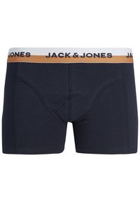 Bóxer de algodón en color navy con cintura de logo en blanco y dorado. Presenta costuras planas y un diseño de ajuste ceñido para mayor comodidad y soporte.