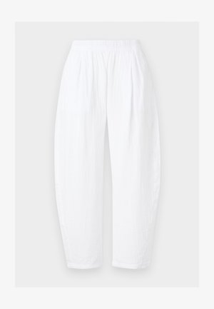 Pantalon à taille élastique blanche, coupe ample avec poches latérales, fabriqué en tissu léger légèrement texturé.