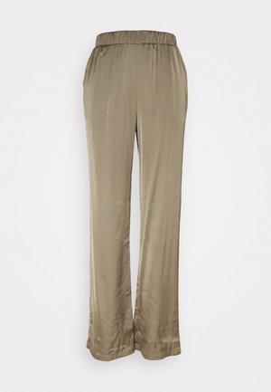 Jasno-beżowe, szerokie spodnie z jedwabistej tkaniny. Posiadają elastyczny pas i boczne kieszenie, o gładkiej, błyszczącej fakturze.