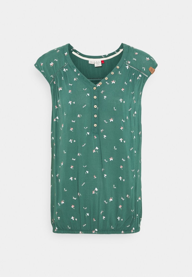 Haut vert à manches courtes en tissu doux, orné de motifs floraux blancs et roses, avec un col en V et une boutonnière sur le devant.