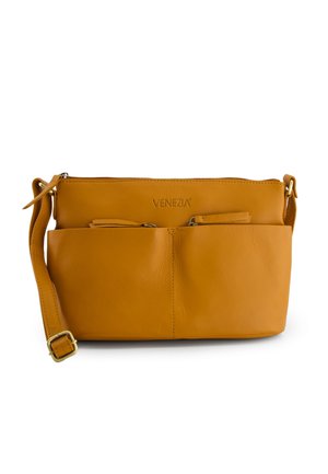 Yellow leather crossbody bag with a zippered top, featuring two front pockets and an adjustable strap. Textured finish; branded "VENEZIA."