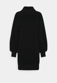 Svart stickad klänning med hög krage, strukturerat mönster, ballongärmar och ribbade muddar och kant.
