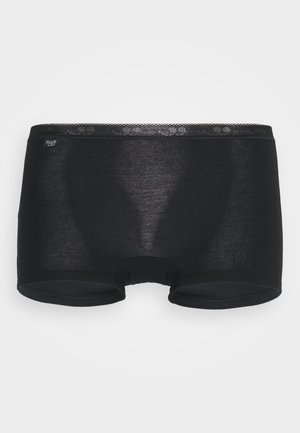 Schwarze Baumwoll-Boxer-Shorts mit glatter Textur, elastischem Bund und ohne sichtbare Nähte. Mit kleinem Markenlogo am Bund.